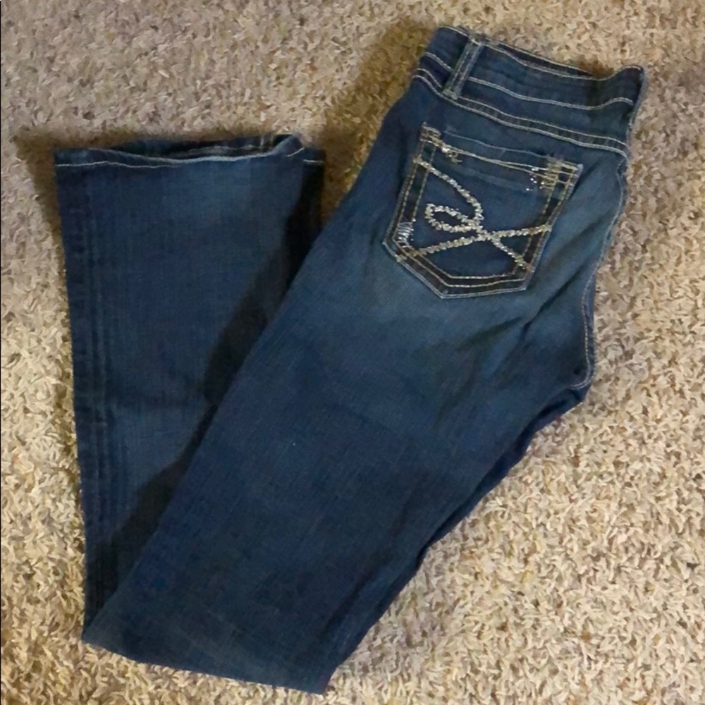 Buckle Sabrina Mid-Rise Bootcut Jeans